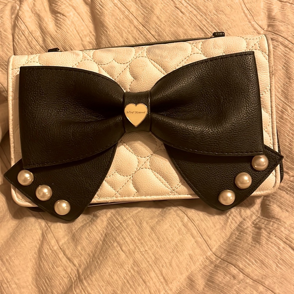 Betsey Johnson light pink and black clutch